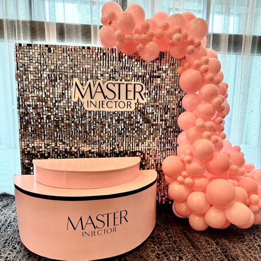 Shimmer disco wall with balloon garland