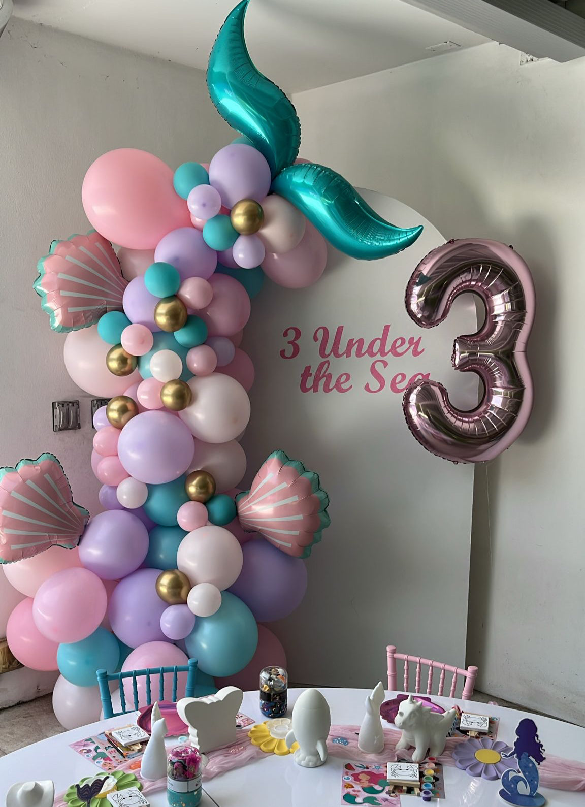 Arch panel backdrop with garland Rental