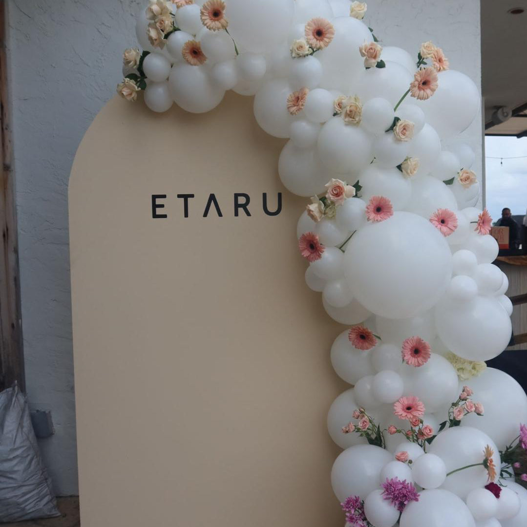 Arch panel backdrop with garland Rental