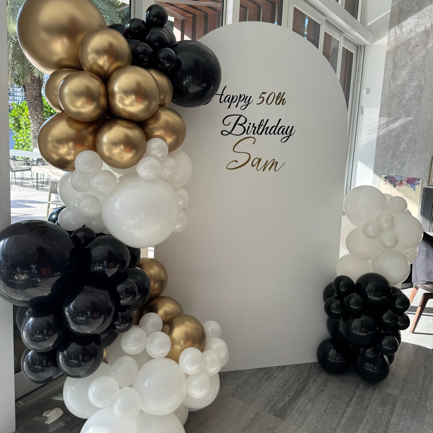 Arch panel backdrop with garland Rental/ Welcome Sign