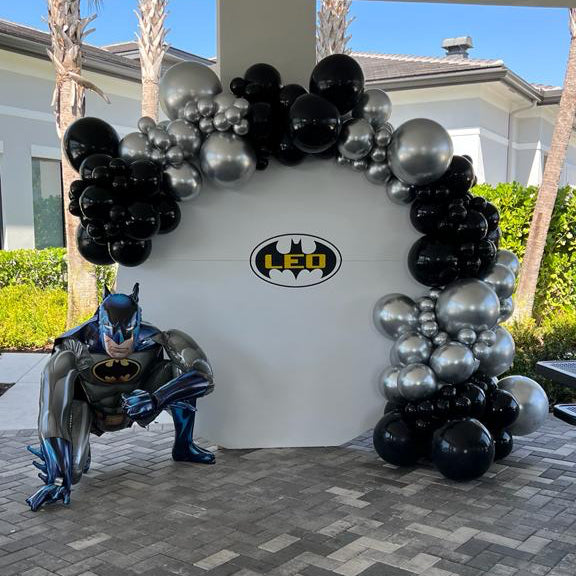 Circle backdrop with balloon garland personalized lettering Rental